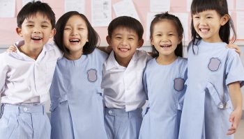 Portait Of Students In Chinese School Classroom